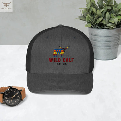 Western dark heather gray retro trucker hat with embroidered calf logo, professional setting
